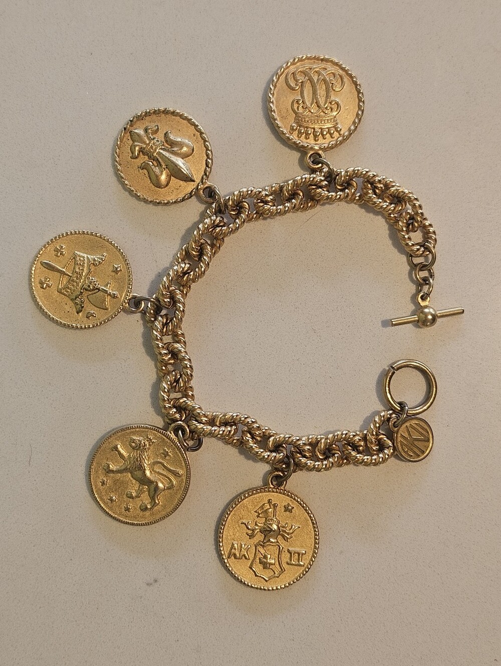 Vintage Designer Anne Klein Etruscan Gold Coin Charm Toggle Bracelet 8"